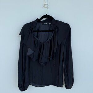 Black ruffled blouse